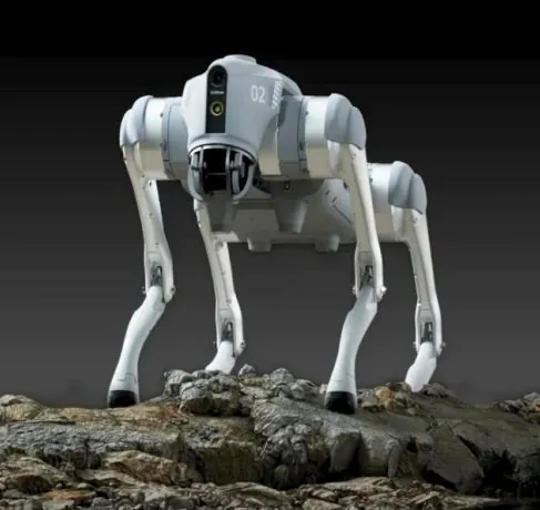 Perro robot cuadrúpedo blanco sobre una roca, ejemplo de robots para empresas
